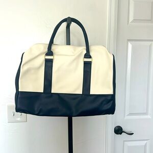 Estée Lauder blue and white weekender bag